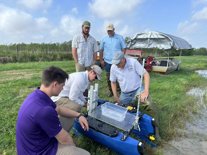 students and faculty working on surface vessek