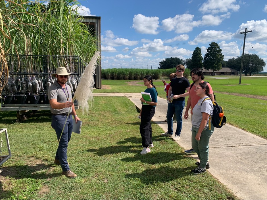 student listening to field lecture