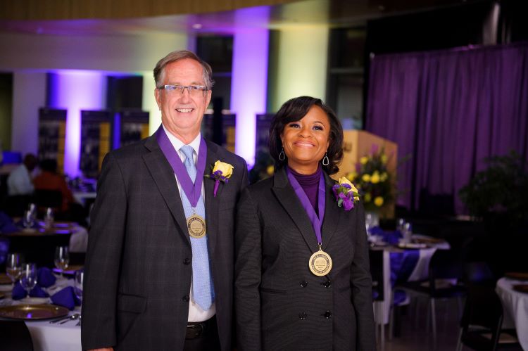 Smith and Knight at HOD event wearing medals. 