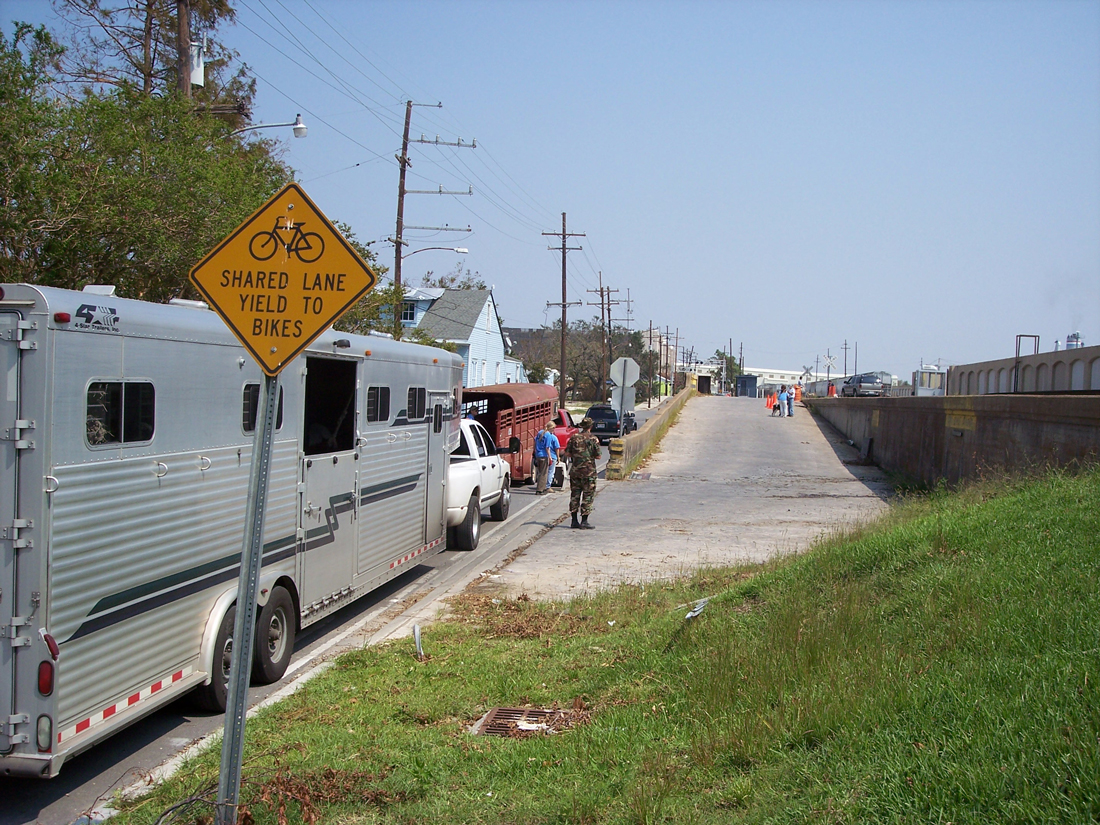 vehicles lined up along the levee